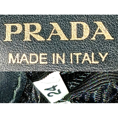 173 - A Prada Black Velvet Chain Shoulder Bag. Black velvet exterior with smooth black leather trim, gold-... 
