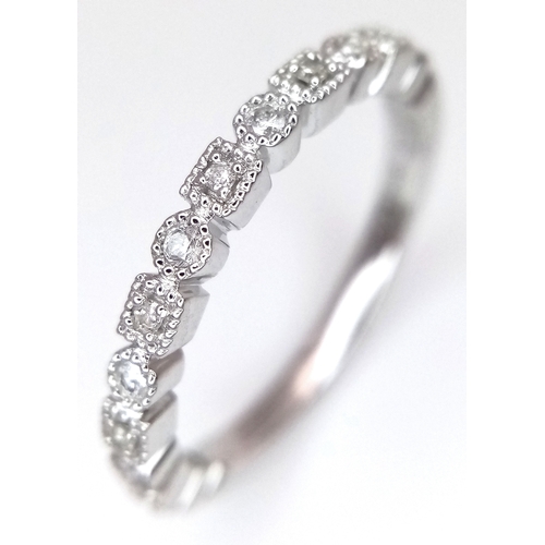 271 - A 9K WHITE GOLD, DIAMOND SET, BEADED EDGE, BAND RING. TOTAL WEIGHT 2.3G, SIZE L. SC 9025