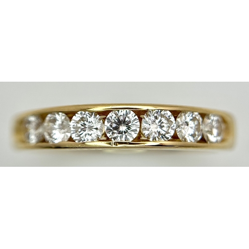 34 - AN 18K YELLOW GOLD, DIAMOND SET, HALF ETERNITY RING. 0.70CTW. 3.9G, SIZE M. SC 1077