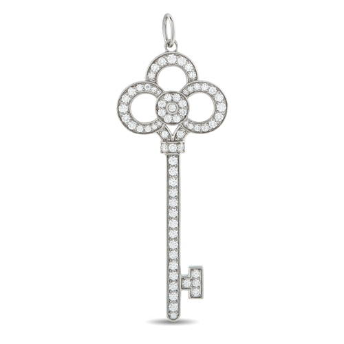 134 - A Platinum 0.64ct Diamond  Tiffany & Co. Crown Key Pendant. Crafted from Platinum, pav Diamonds with... 