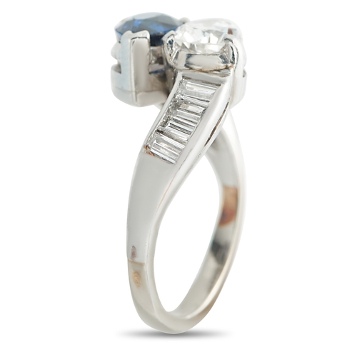 166 - A  Platinum 1.30ct Diamond and Sapphire Ring.  0.95 carat pear-shaped Diamond is perfectly paired wi... 