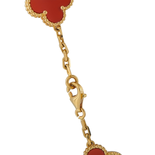 17 - A Van Cleef & Arpels Alhambra 18K Yellow Gold Carnelian 20-Motif Necklace. Crafted from 18K Yellow G... 