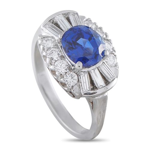 261 - A  Platinum 0.70ct Diamond and Sapphire Ring. Platinum setting is elevated by a stunning 1.85 carat ... 