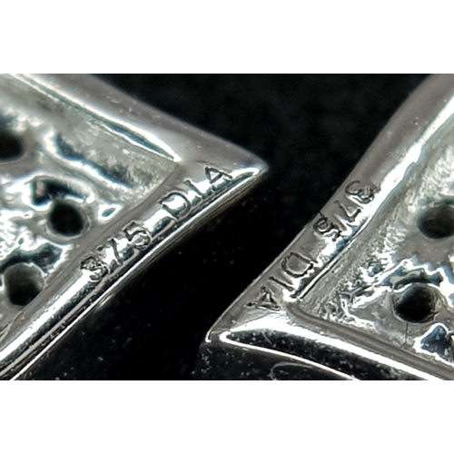 566 - A PAIR OF 9K WHITE GOLD, DIAMOND SET, HEART SHAPED STUD EARRINGS. 1.3G. NEEDS BUTTERFLY BACKS.  SC 1... 