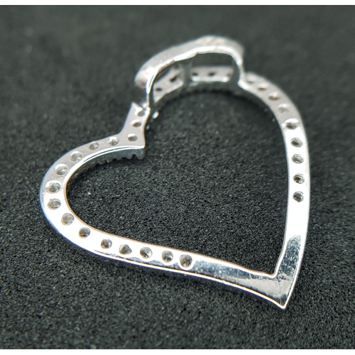 573 - A 9K WHITE GOLD, DIAMOND SET , OPEN HEART PENDANT. 1.2G. SC 1013