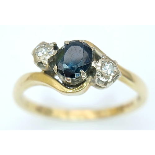42 - Classic 18 CARAT GOLD CROSSOVER STYLE RING. CENTRE SAPPHIRE with DIAMOND POINT SIDES . 3.6 Grams. Si... 