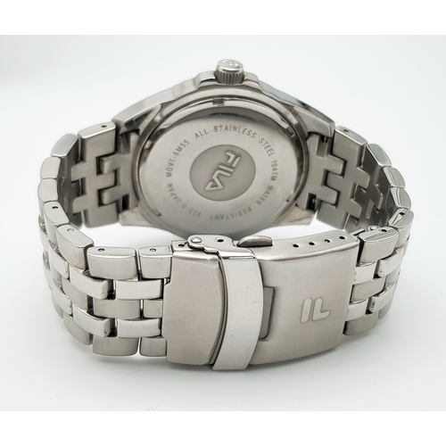 603 - A Fila Branded Stainless Steel Quartz Gents Watch. Stainless steel bracelet and case - 42mm. White d... 