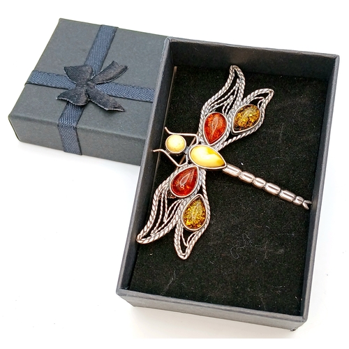 1221 - A large vintage 925 silver dragonfly brooch with amber stones. Features multi-colored amber insets o... 