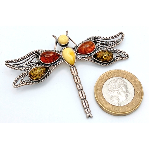 1221 - A large vintage 925 silver dragonfly brooch with amber stones. Features multi-colored amber insets o... 
