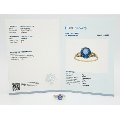 562 - A 14K YELLOW GOLD, 2.75ctw Oval Mixed Cut Natural Sapphire Ring with Diamond Accents. A 2.64ct oval ... 