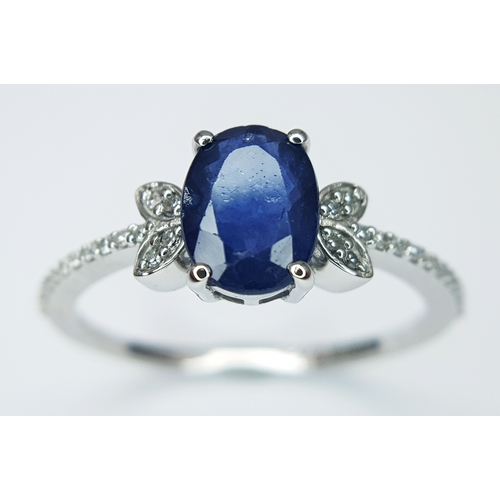 569 - A 950 PLATINUM, 1.69ctw Oval Mixed Cut Natural Sapphire Ring with Diamond Accents. Size N 1/2. Sapph... 