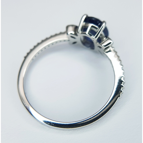 569 - A 950 PLATINUM, 1.69ctw Oval Mixed Cut Natural Sapphire Ring with Diamond Accents. Size N 1/2. Sapph... 