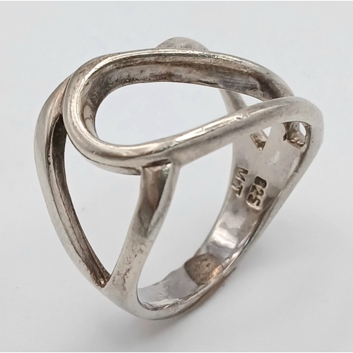 1223 - A 925 Silver Modernist Openwork Ring. Size P, 4.43g weight.