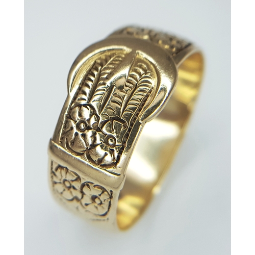 18 - A 9K Yellow Gold Band Ring in Belt Form. 8/9mm width. Size W - W1/2. 5.75g.