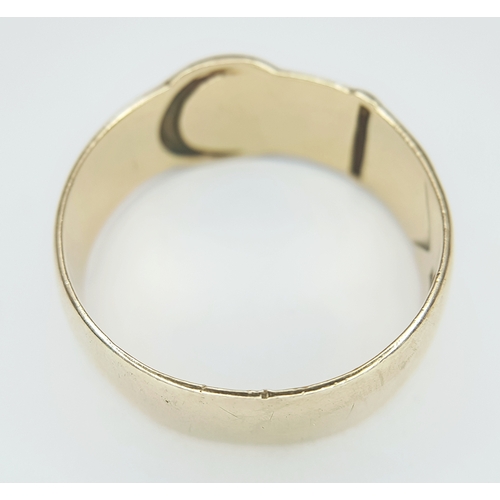 18 - A 9K Yellow Gold Band Ring in Belt Form. 8/9mm width. Size W - W1/2. 5.75g.