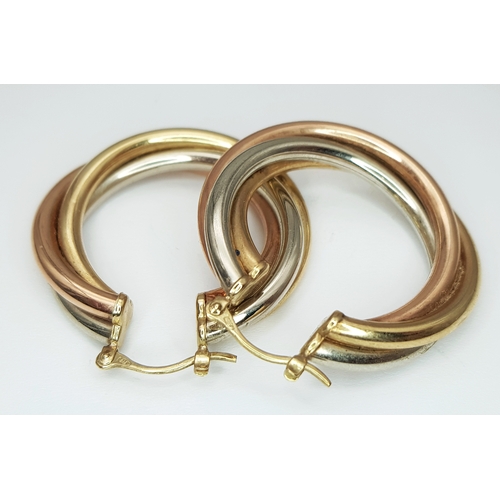 53 - A Pair of 9K Tri-Coloured Crossover Gold Hoop Earrings. 6.95g total weight. 3.5cm.