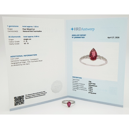 555 - A 950 PLATINUM, 1.12ctw Brazilian Pink Tourmaline Ring with Diamond Accents. A 1.03ct pear mixed cut... 