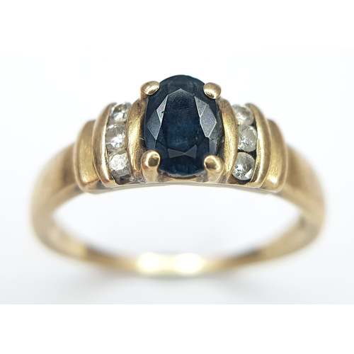 60 - A 9K Yellow Gold Diamond and Sapphire Ring. Size K 1/2. 2.2g.