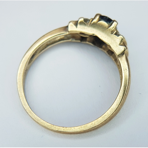 60 - A 9K Yellow Gold Diamond and Sapphire Ring. Size K 1/2. 2.2g.