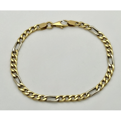 36 - An 18K Yellow and White Gold Fancy Figaro Link Bracelet. 18cm. 5.25g, clasp as found, see photo.