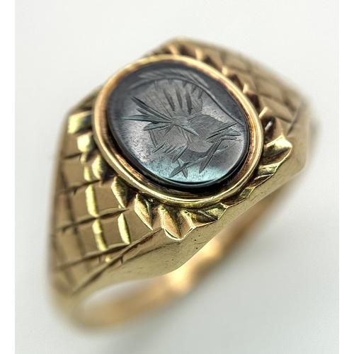 32 - A 9K Yellow Gold Intaglio Stone Set Signet Ring. Size Y. 3.5g.