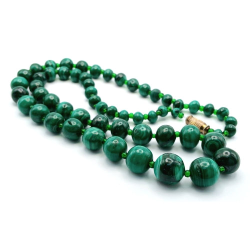 1227 - A Pretty Malachite Bead Necklace. Approx 54cm length.