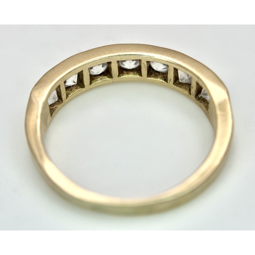 46 - A 14K Yellow Gold (tests as) White Stone Half Eternity Ring. Size L 1/2. 2.7g total weight.