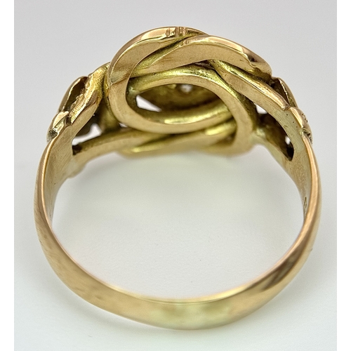 17 - An Antique 18K Yellow Gold and Diamond Lovers Knot Ring. Size M 1/2. 5.46g.