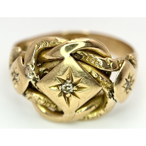 17 - An Antique 18K Yellow Gold and Diamond Lovers Knot Ring. Size M 1/2. 5.46g.