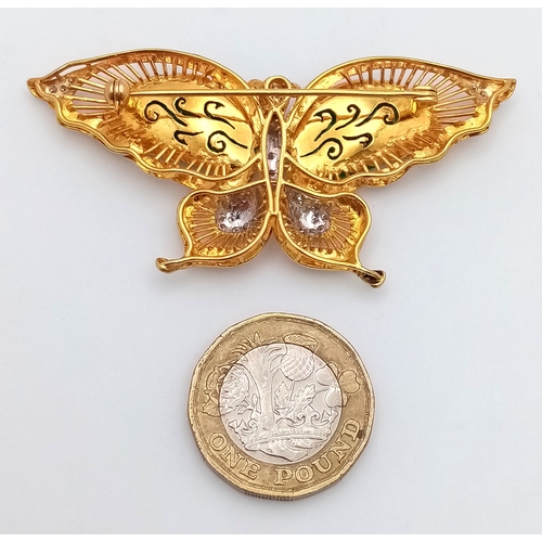 50 - The Butterfly Queen! An 18K Yellow Gold, jade, diamond and ruby butterfly that can be worn as a broo... 