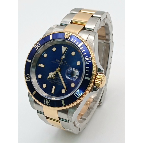 876 - A Classic Rolex Bi-Metal Submariner Automatic Gents Watch. Model 16613. Gold and stainless steel bra... 