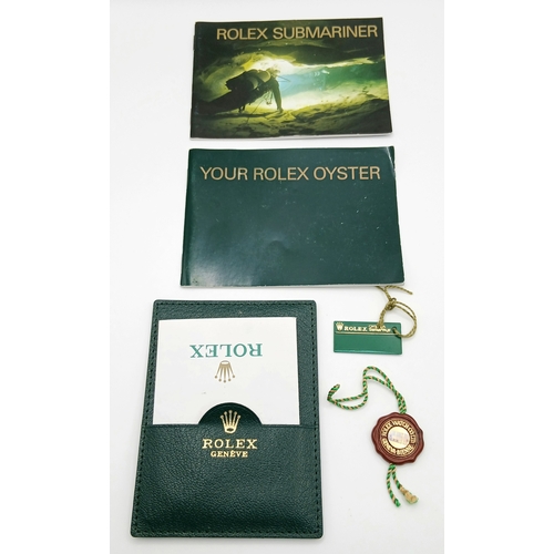 876 - A Classic Rolex Bi-Metal Submariner Automatic Gents Watch. Model 16613. Gold and stainless steel bra... 