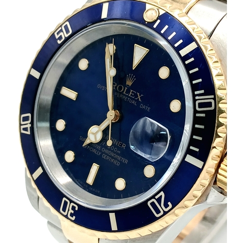 876 - A Classic Rolex Bi-Metal Submariner Automatic Gents Watch. Model 16613. Gold and stainless steel bra... 