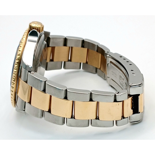 876 - A Classic Rolex Bi-Metal Submariner Automatic Gents Watch. Model 16613. Gold and stainless steel bra... 