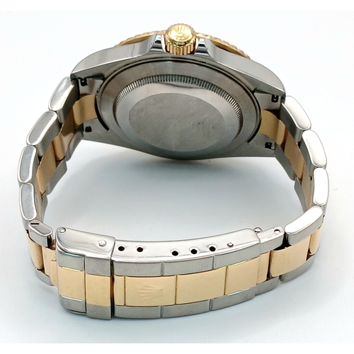 876 - A Classic Rolex Bi-Metal Submariner Automatic Gents Watch. Model 16613. Gold and stainless steel bra... 