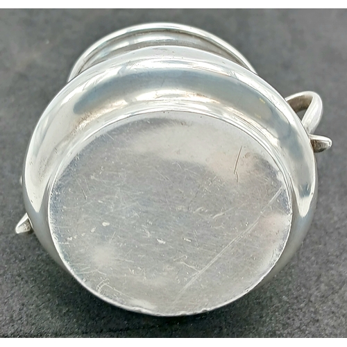 575 - An Antique Sterling Silver Twin-Handled Cup. London hallmarks, 1903. Approx 5.5cm x 4cm. Total weigh... 