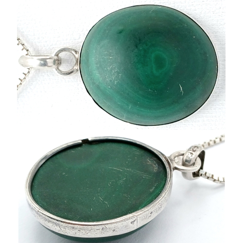 1212 - A 925 Silver Necklace with an Oval Malachite Pendant. Both necklace and pendant are hallmarked 925. ... 