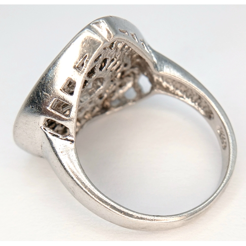 1241 - A 925 Silver Heart Shaped Clear Stone Cluster Ring. Heart shaped centre with clear stone set halo an... 