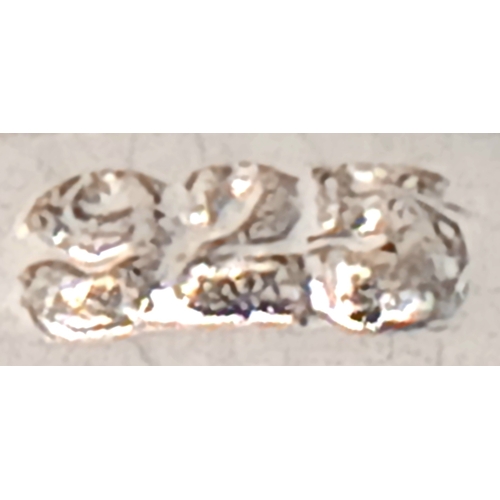 1241 - A 925 Silver Heart Shaped Clear Stone Cluster Ring. Heart shaped centre with clear stone set halo an... 