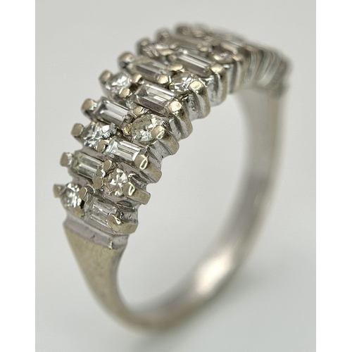 27 - AN 18K WHITE GOLD, MIXED CUT, DIAMOND SET RING. 0.25CTW. 4.9G, SIZE M. JB 2007