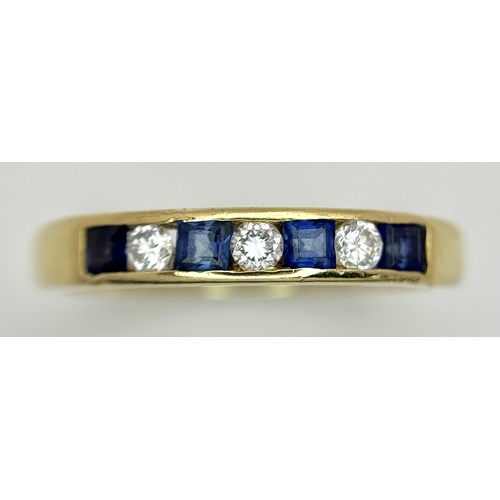 41 - AN 18K YELLOW GOLD, DIAMOND AND SAPPHIRE SET, CHANNEL SET, HALF ETERNITY RING. 3.1G, SIZE N. TAN 200... 