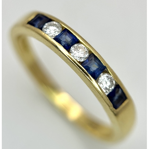 41 - AN 18K YELLOW GOLD, DIAMOND AND SAPPHIRE SET, CHANNEL SET, HALF ETERNITY RING. 3.1G, SIZE N. TAN 200... 