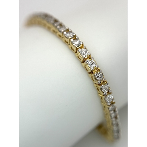 55 - A 14K YELLOW GOLD, DIAMOND SET, TENNIS / LINE BRACELET. APPROX 3CTW. 13G. SC 2061