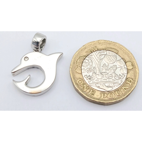 559 - A 9K WHITE GOLD, DIAMOND SET, DOLPHIN PENDANT / CHARM. 2.3G. SC 2036