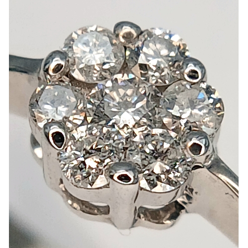 573 - A 9K WHITE GOLD, DIAMOND SET CLUSTER RING. 0.25CTW. 1.8G, SIZE Q. SC 2039