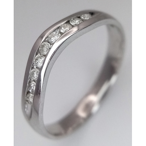 594 - A 9K WHITE GOLD, DIAMOND SET, SHAPED BAND RING. 0.14CTW. 1.8G, SIZE N. SC 2043