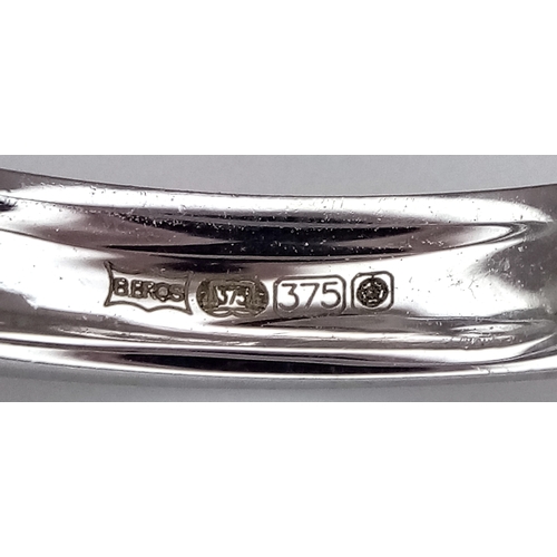 594 - A 9K WHITE GOLD, DIAMOND SET, SHAPED BAND RING. 0.14CTW. 1.8G, SIZE N. SC 2043