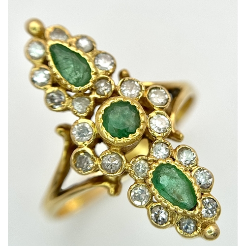 6 - AN 18K YELLOW GOLD, DIAMOND AND EMERALD SET, MARQUISE SHAPED, COCKTAIL RING. 4.7G, SIZE Q. TAN 2002