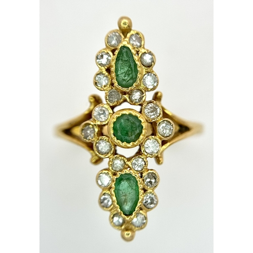 6 - AN 18K YELLOW GOLD, DIAMOND AND EMERALD SET, MARQUISE SHAPED, COCKTAIL RING. 4.7G, SIZE Q. TAN 2002
