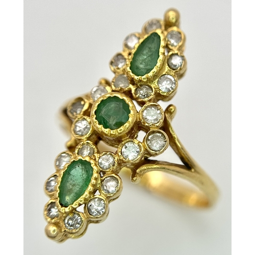 6 - AN 18K YELLOW GOLD, DIAMOND AND EMERALD SET, MARQUISE SHAPED, COCKTAIL RING. 4.7G, SIZE Q. TAN 2002